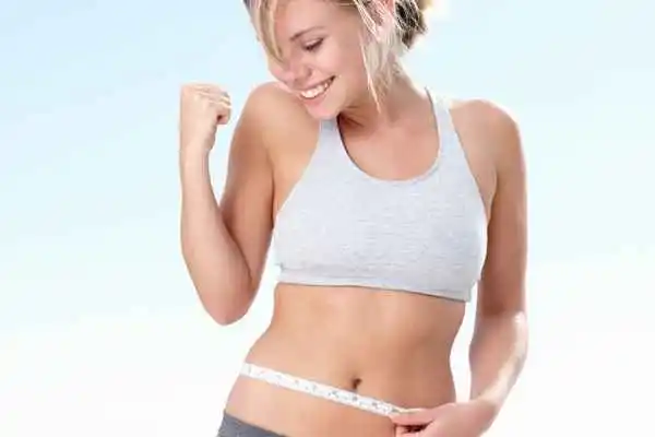 woman happy after fat reduction treatment Uckfield